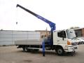 Услуги самопогрузчика Hino 500 борт 6 тонн, стрела 3 тонн